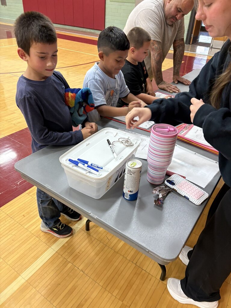 Three boys playing a math game