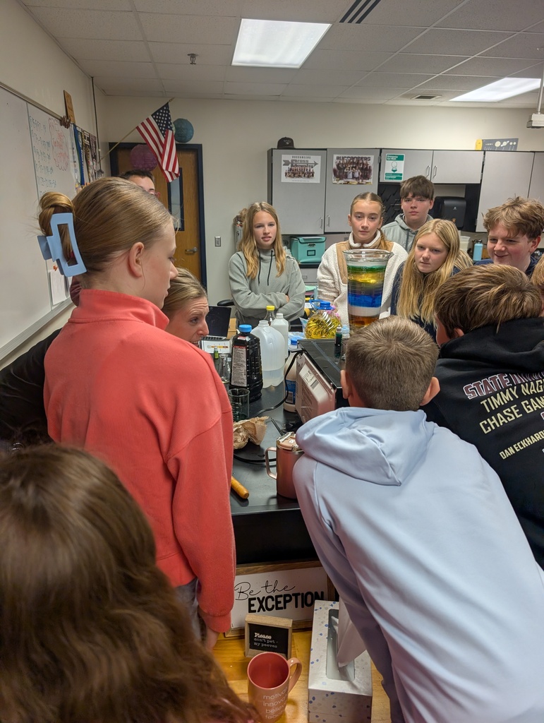 Students checking out the container