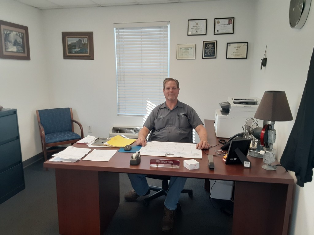 transportation director at his desk.