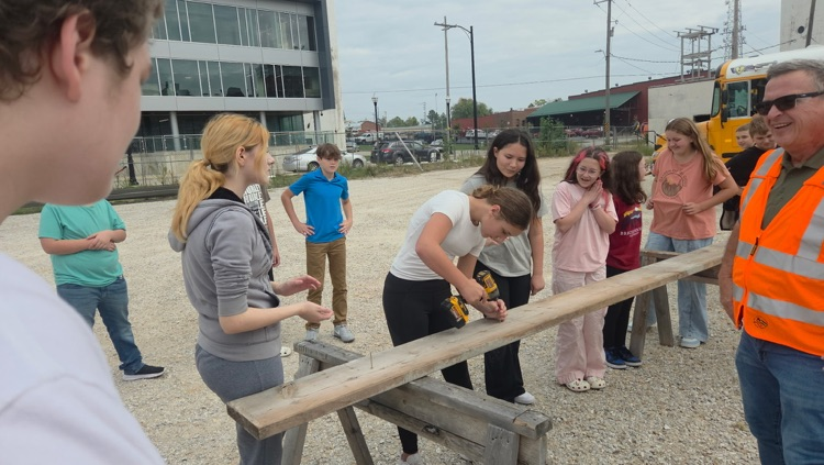 students on construction site.