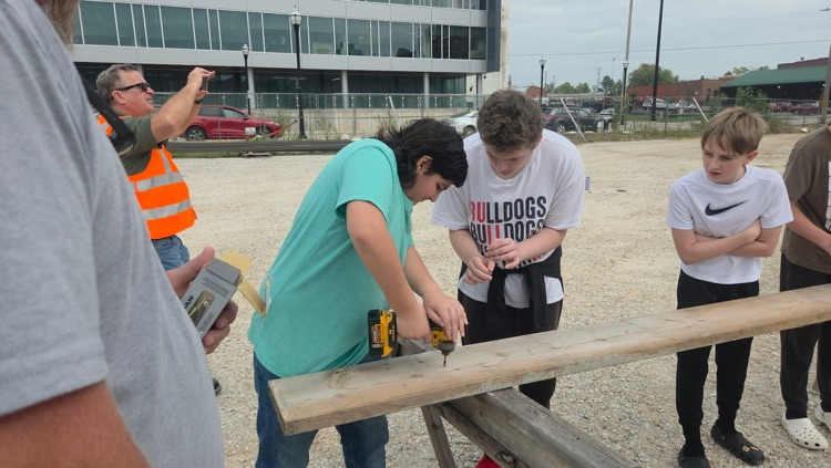 students on construction site.