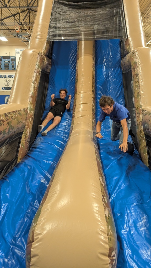 Students coming down the slide