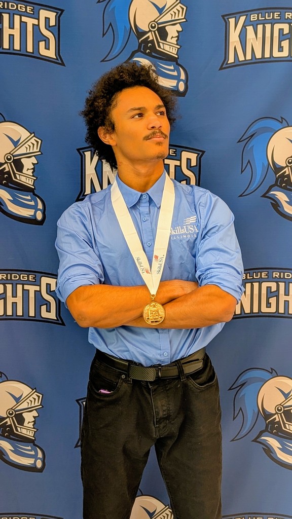 Senior Romero Fernandez poses with his medal from Skills USA. 