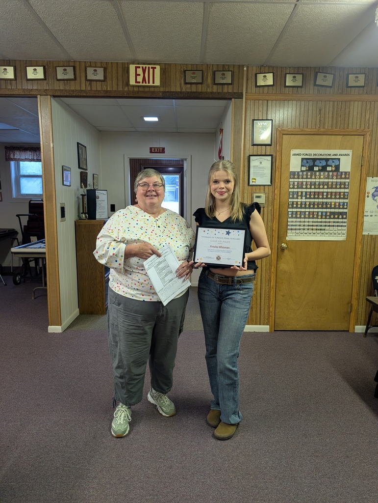 Presley with her award certificate for the 2026 Patriotic Art Contest
