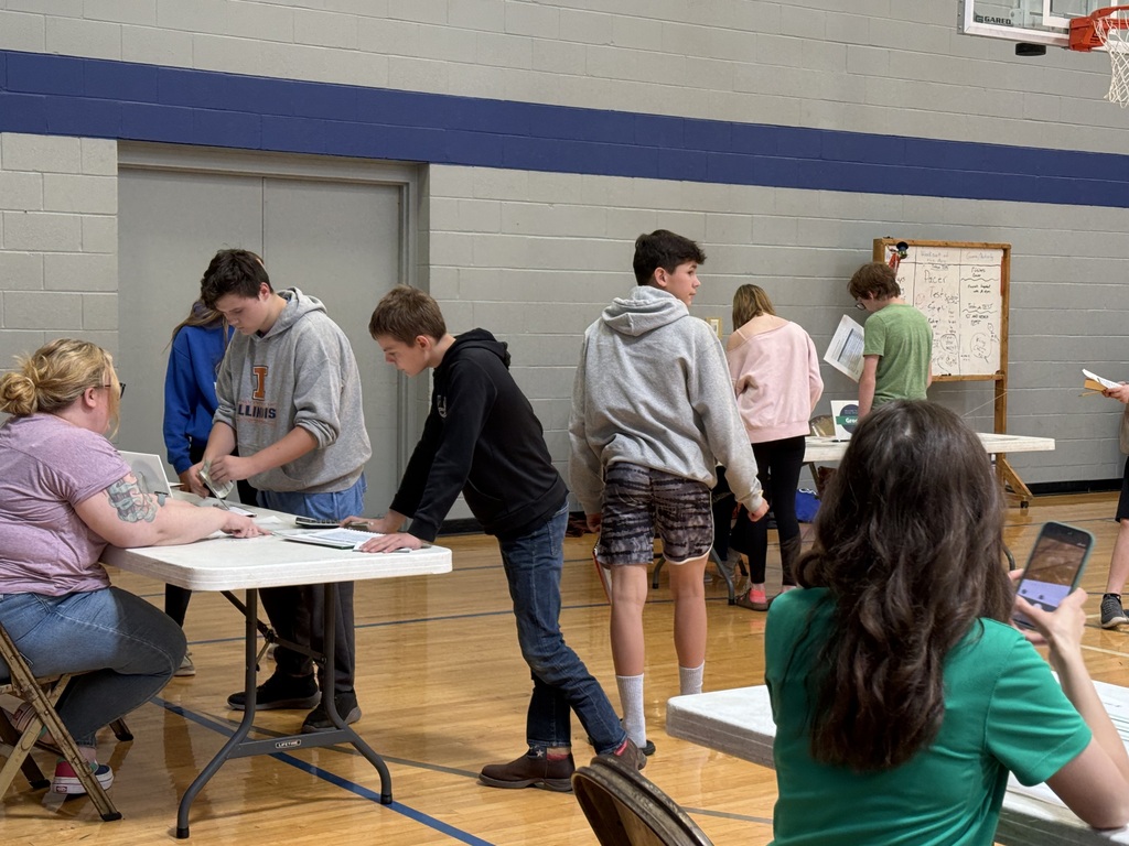 8th grade students participating in the "real world" simulation