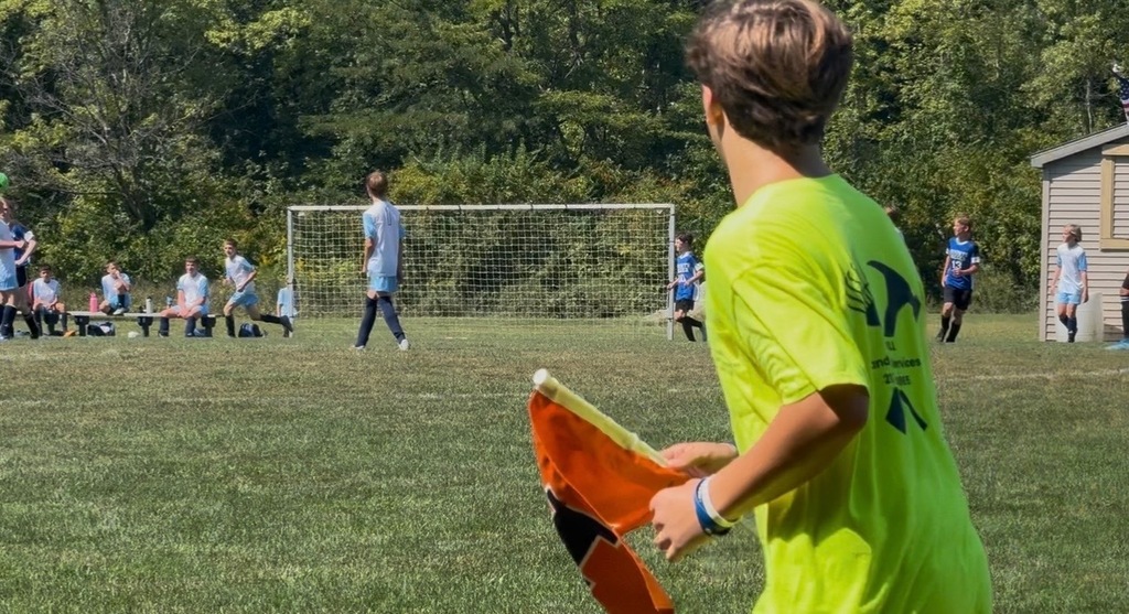 Billie Peterson helping at the first BRIJHS Soccer Game of the Season