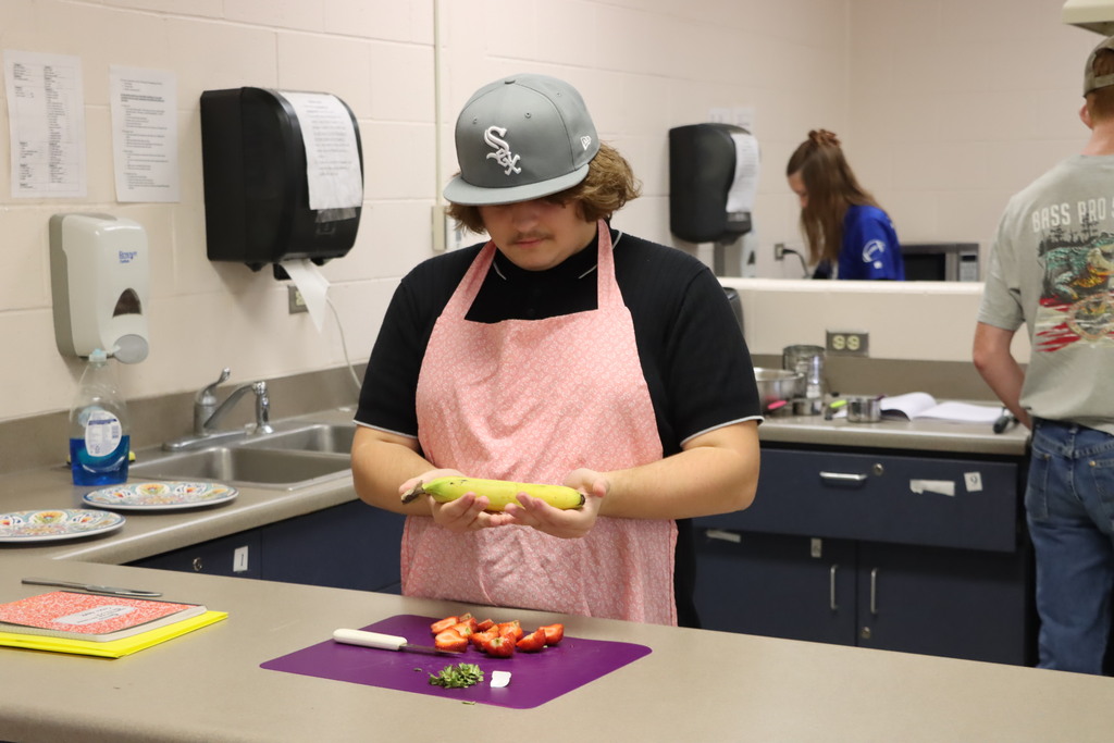 Prepping the fruit for crepes