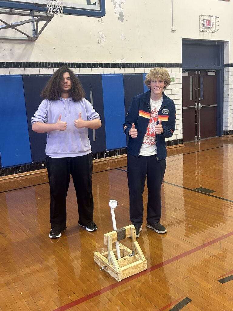 Julian Bethune and Kaleb Forrest with their catapult. 