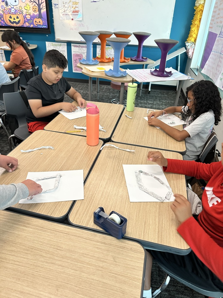 student designing a closed circuit