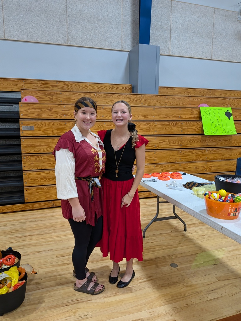 Maryn and Alli wait for ghosts and goblins to play. 