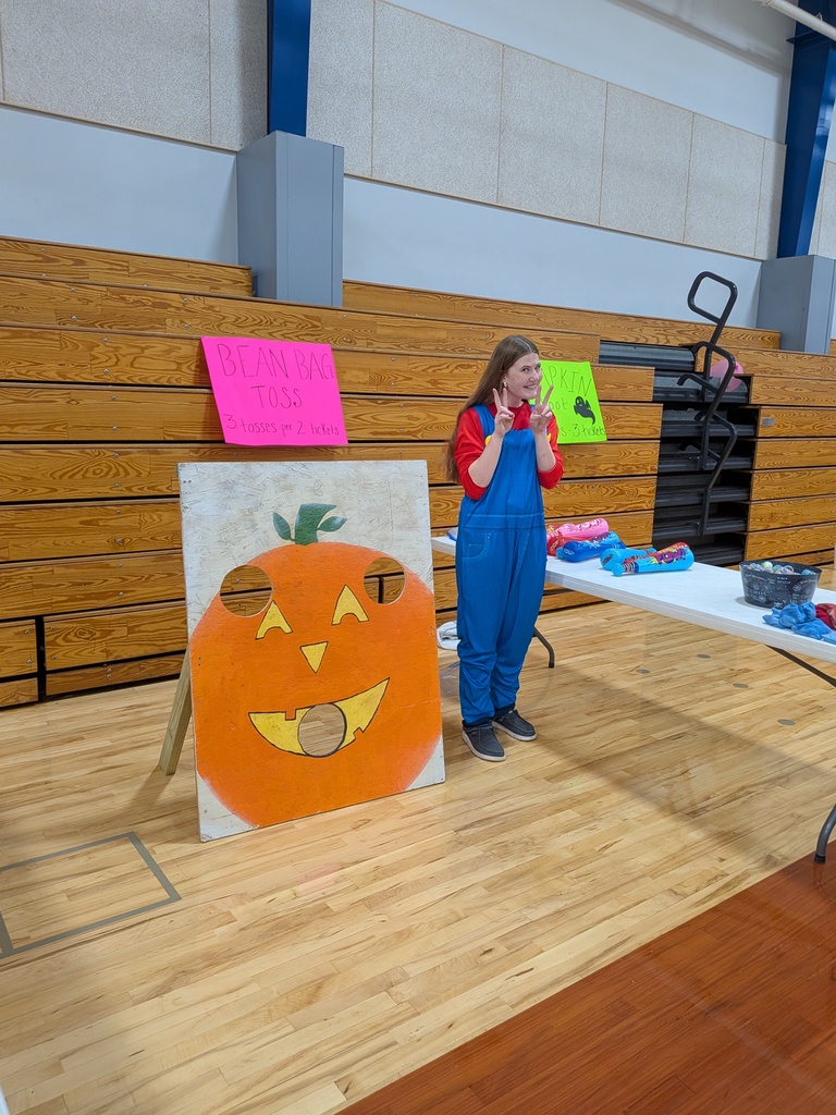 Lydia can hardly wait for little spooks to visit her booth