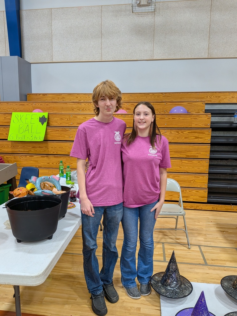 Hunter and Payton have the witches hat toss game ready to go. 