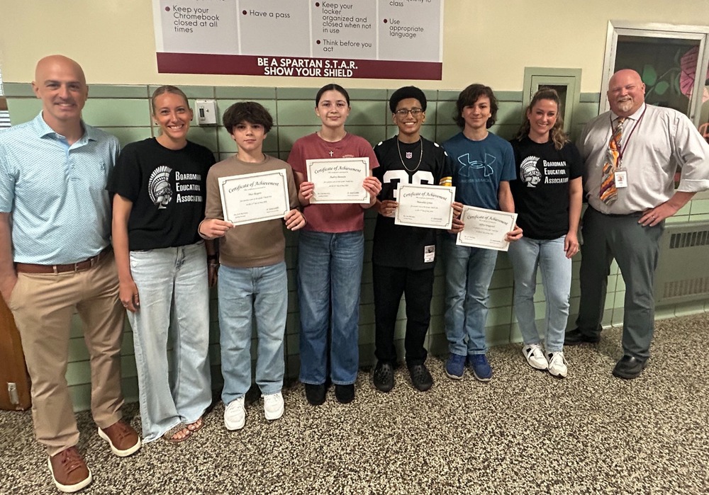 7th grade students with perfect math certificates with teachers, superintendent and mr. cardillo