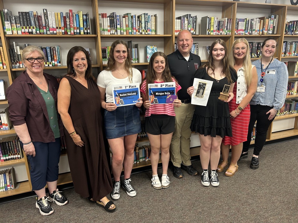 blackout poetry winners with teachers and principals and librarian