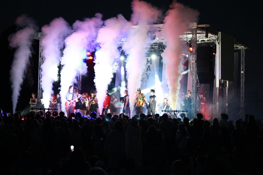 project mayhem stage lit up with smoke 
