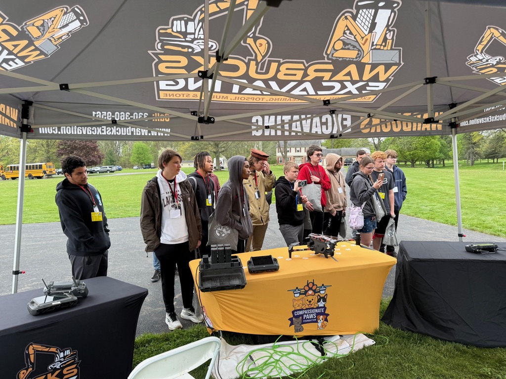 Students at Drone showcase table