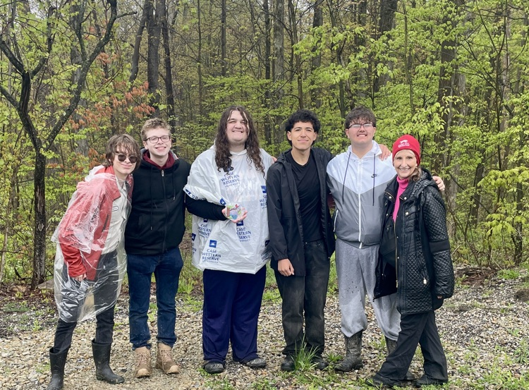 boys enviro team with medals and Ms. Moran
