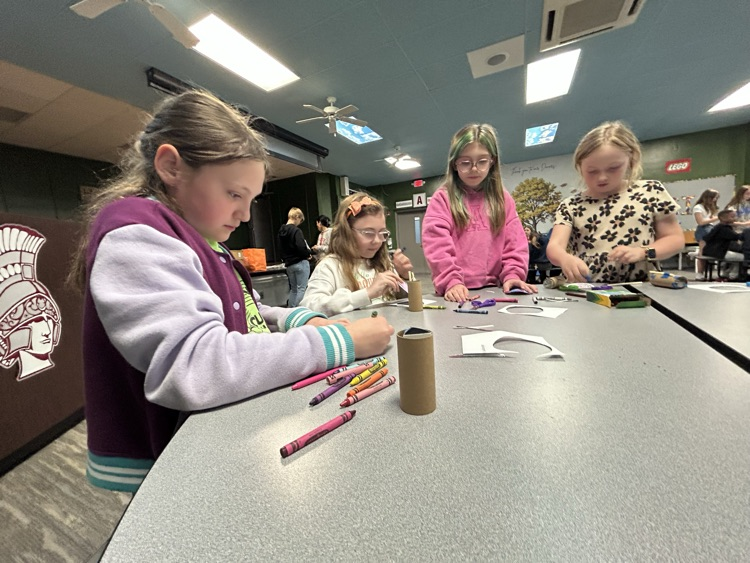 students working together around a table