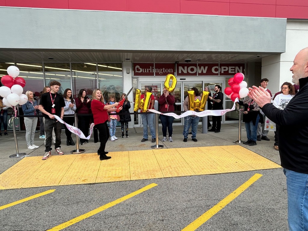 Burlington Store ribbon cutting with ceremonial scissors
