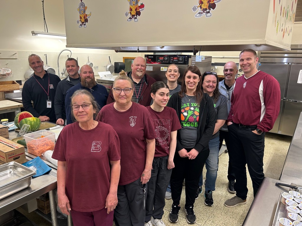 Stadium Drive cafeteria workers with central office team and principal zoccali