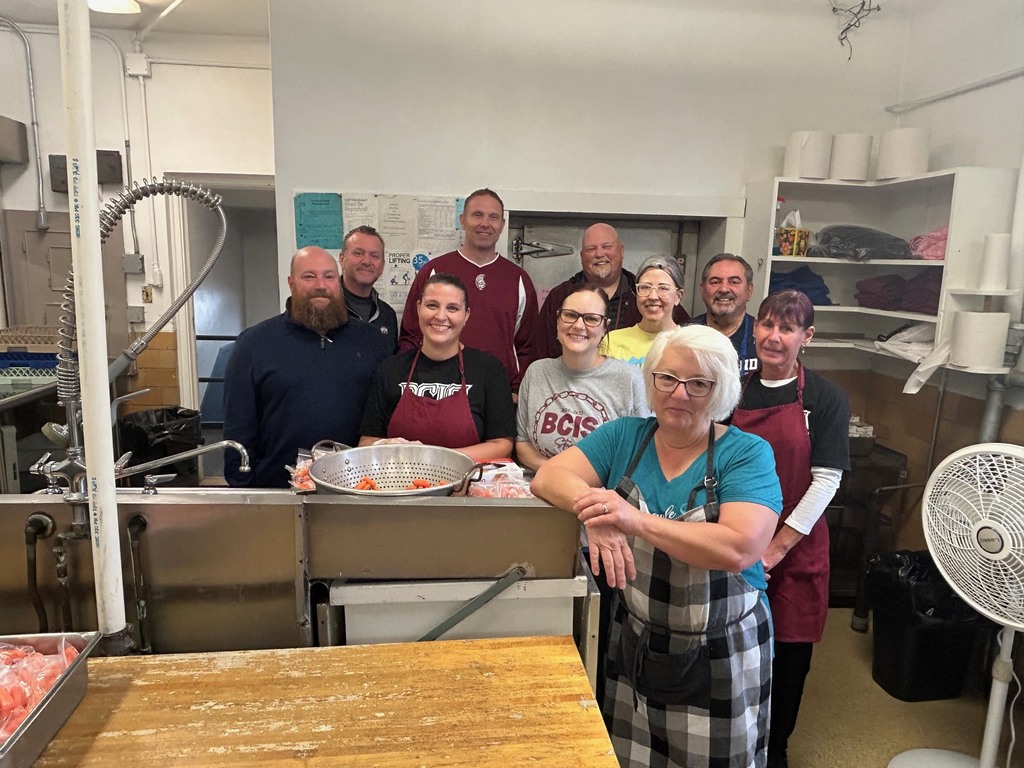 Center Intermediate cafeteria workers with central office team