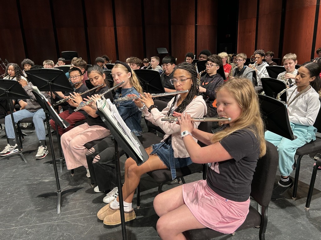 girls playing flutes 
