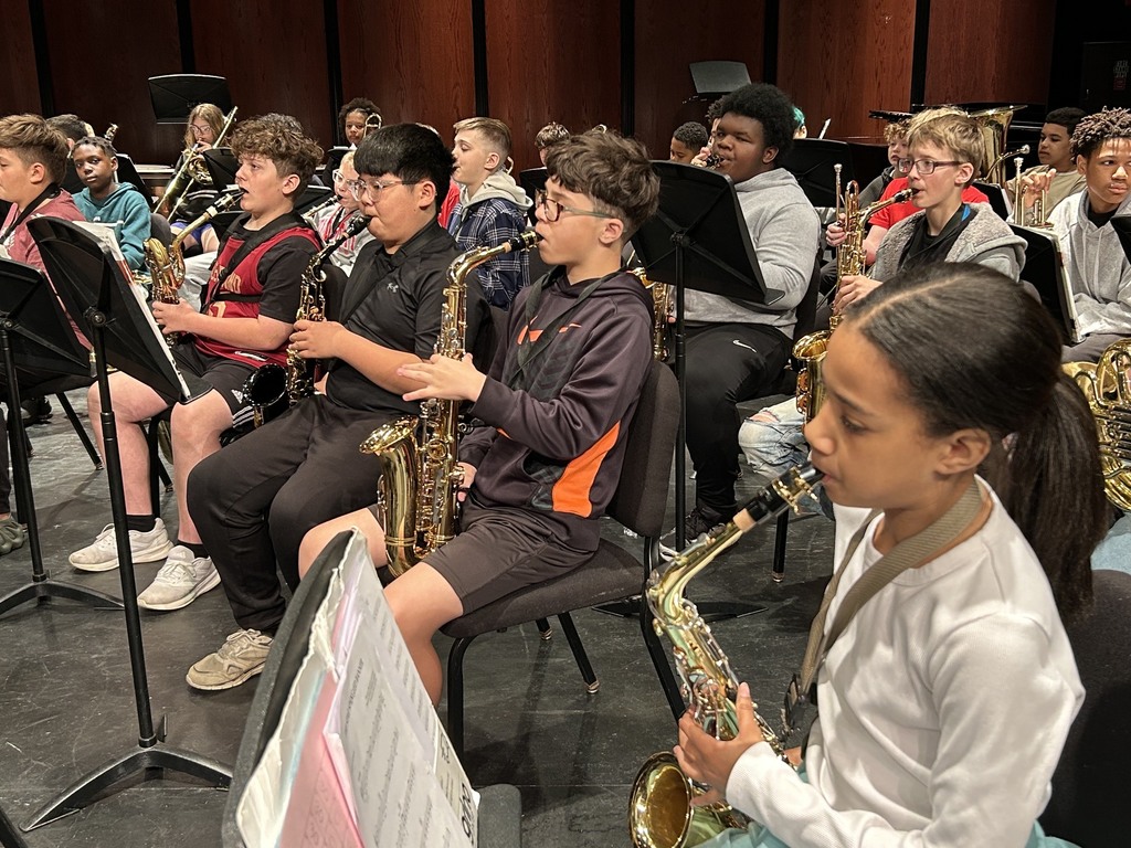 students playing saxophones