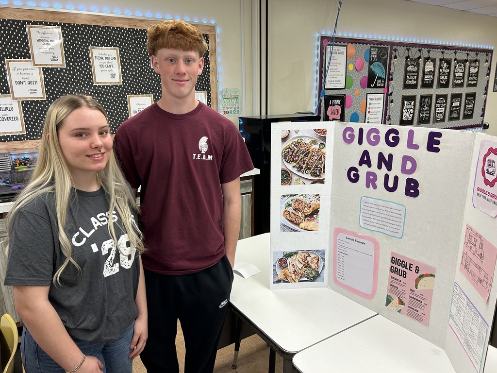 a boy and girl with a food service business and food truck called Giggle and Grub