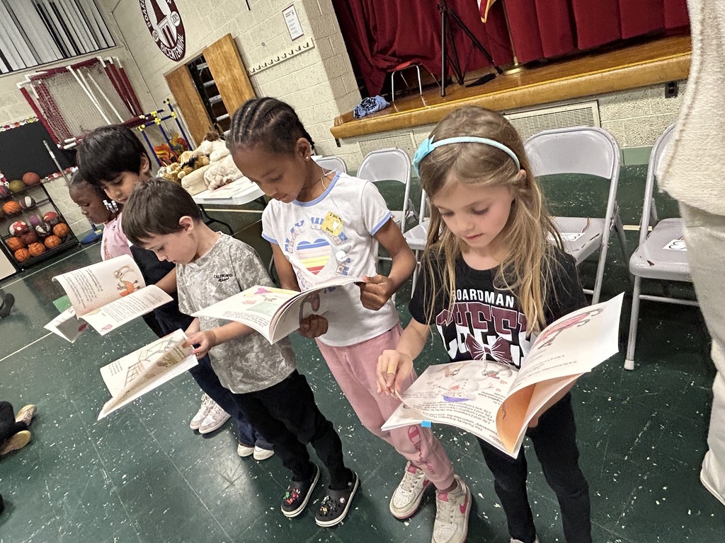 robinwood students paging through her books