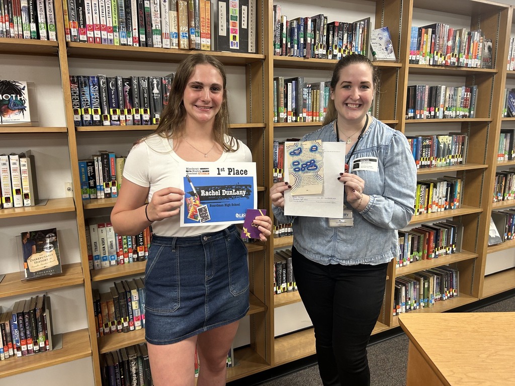 1st place Rachel Dunlany with certificate and Librarian Amy Burkard