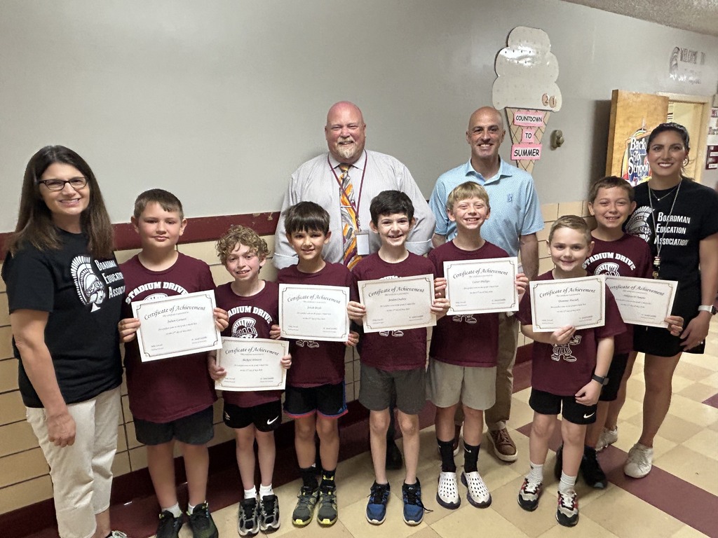 7 3rd graders with perfect score certificates and their teachers, Mr. Niefer and Mr. Cardillo