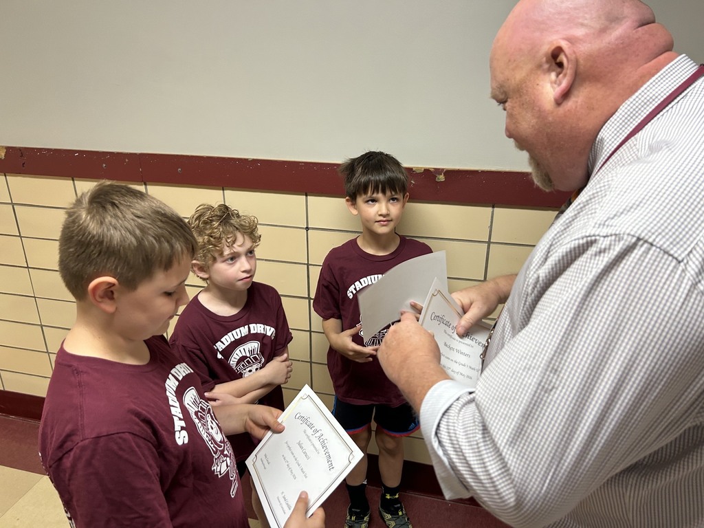 Superintendent Neifer handing out Perfect Score Certificates