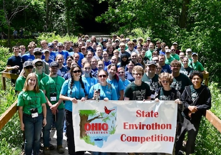 students with State Envirothon banner