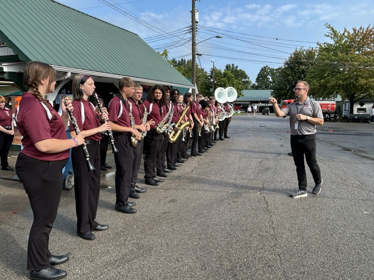 Mr. Tuite with section leaders prepare for national anthem 