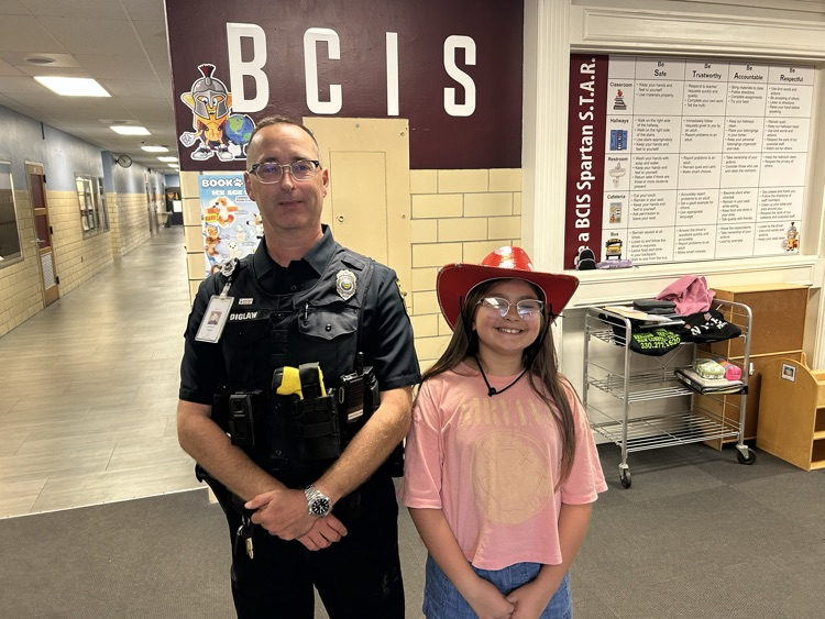 SRO Diglaw and a student in a cowboy hat 