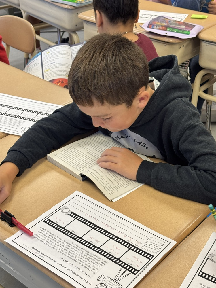 boy reading for stop drop and read