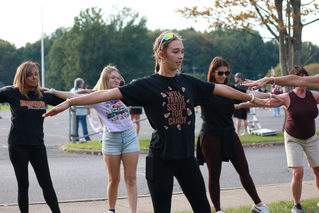 practicing the sweetheart line dance with alumni