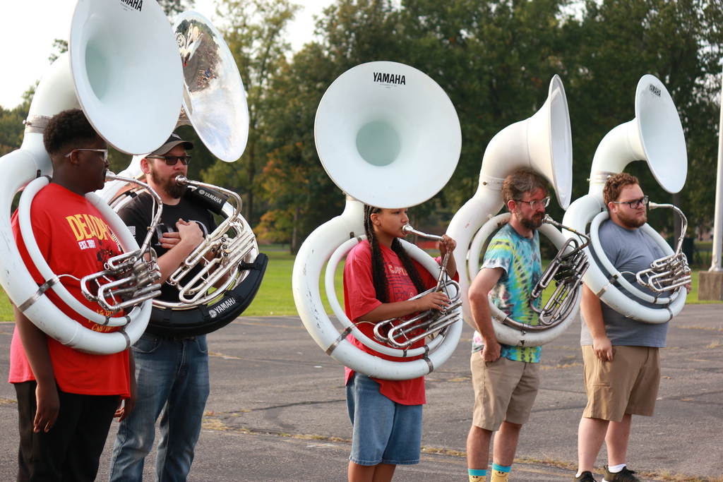 Tuba players both current students and alumni