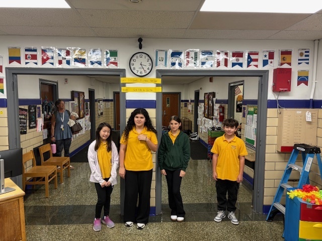 BMS Multicultural Club members help decorate our entry with flags to celebrate Hispanic Heritage month !!