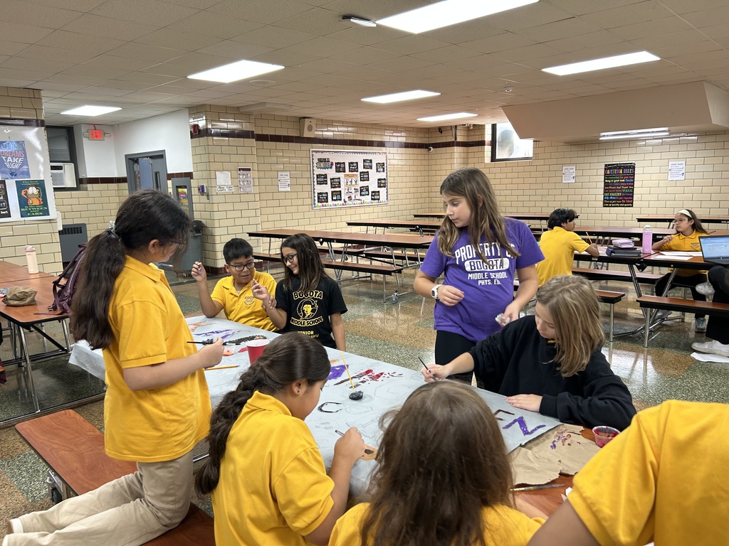 The Art Club hard at work creating posters for the BMS Trunk or Treat event coming up on Thursday, 11/29🎃
