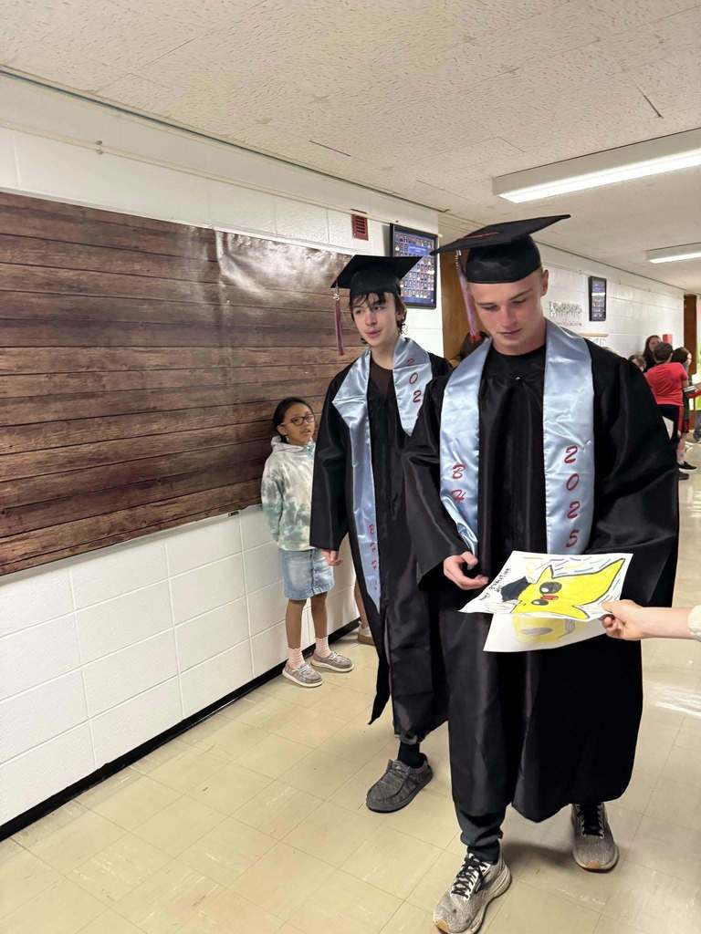 High School graduates walking down the hall