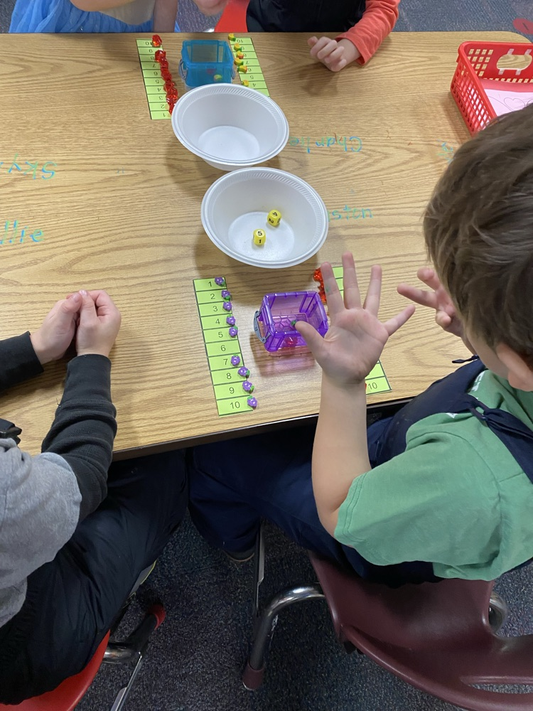 We play games to learn simple addition. 