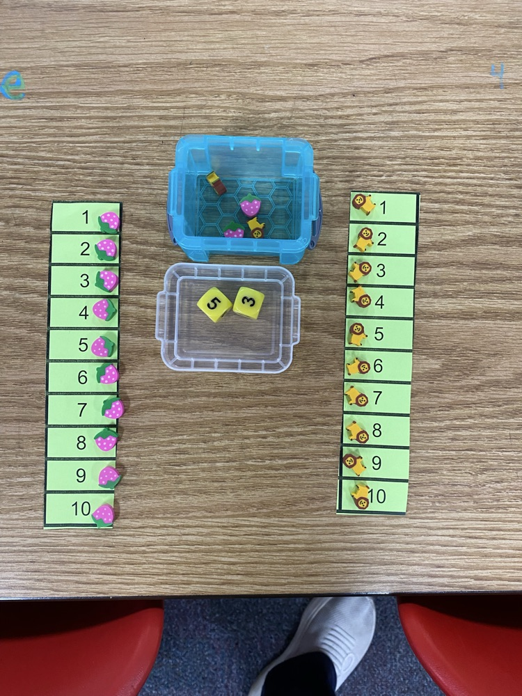 We play games to learn simple addition. 
