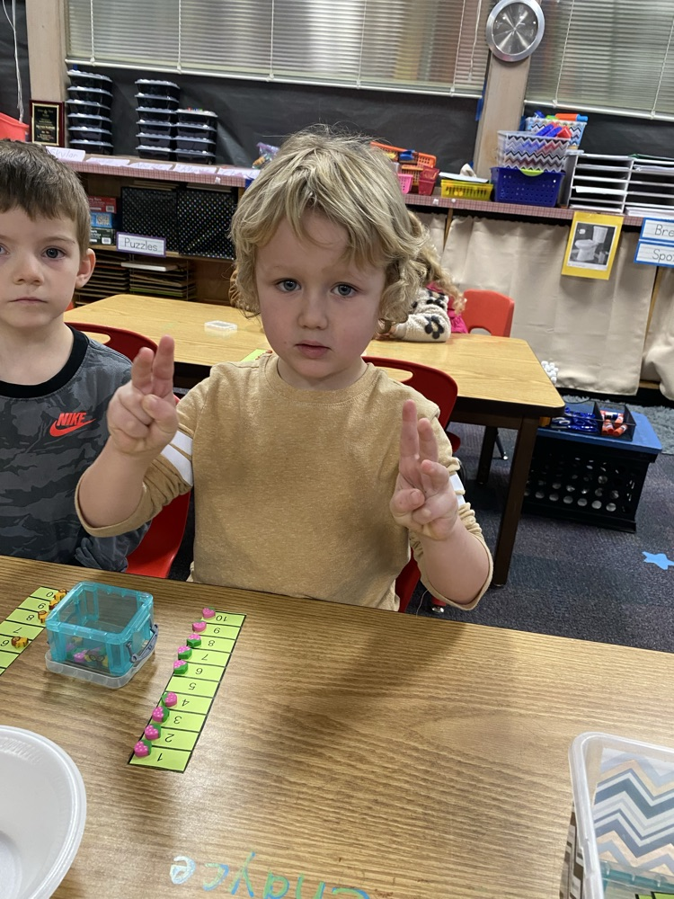 We play games to learn simple addition. 