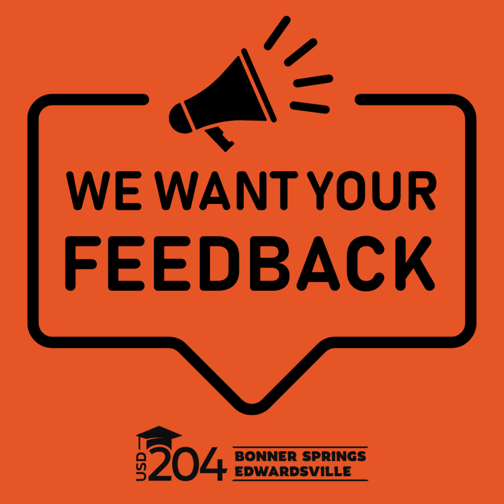 Orange graphic with a black megaphone icon and bold text inside a speech bubble reading: 'We Want Your Feedback.' At the bottom is the USD 204 Bonner Springs Edwardsville logo.