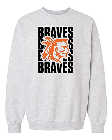 A light gray crewneck sweatshirt featuring the word “BRAVES” stacked vertically in bold black letters. An orange illustrated profile of a Native American head with feathers overlays the text.