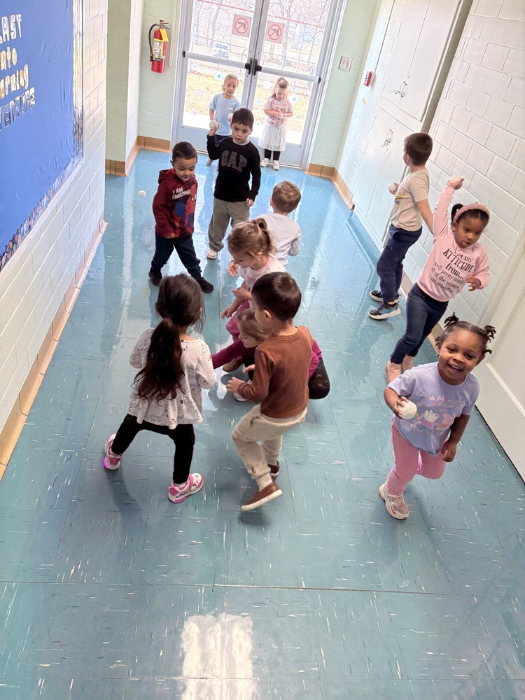 kids having a snowball fight indoors