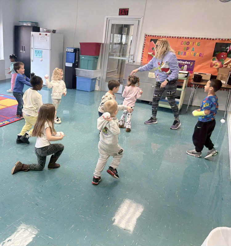 kids having a snowball fight indoors