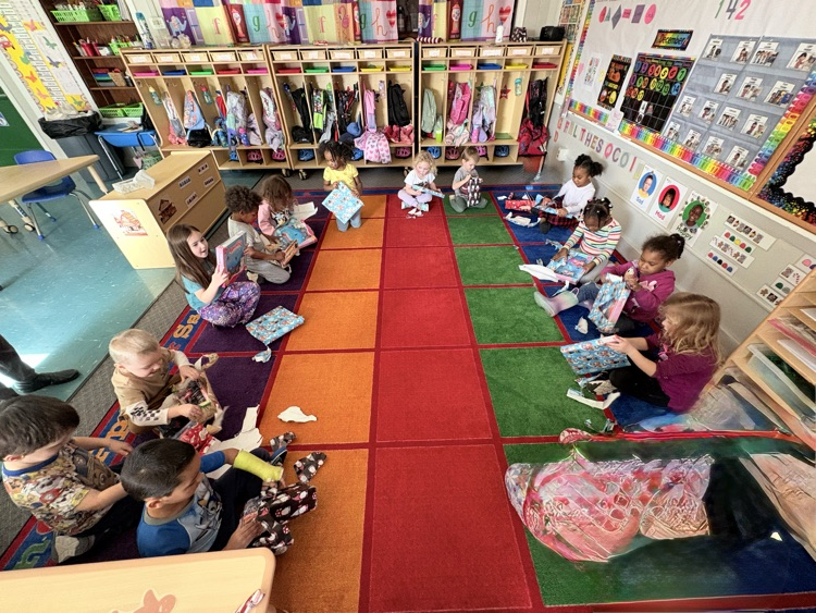 kids actively opening gifts