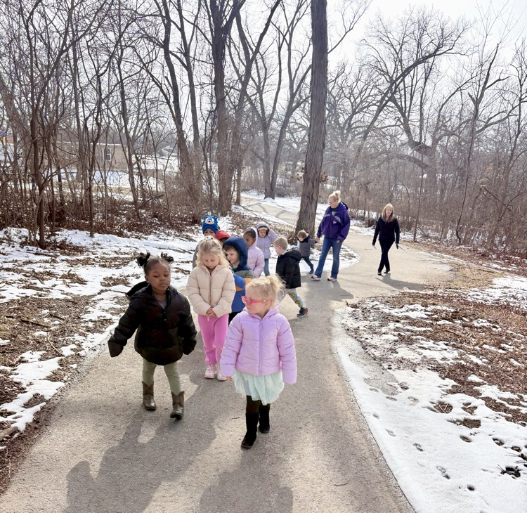 kids walking on a trail